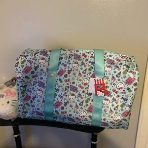 Hello Kitty Bundle with duffle bag &Hello Kitty House slippers size medium